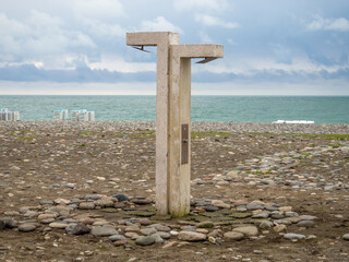 Shower on the beach. Washbasin on the beach. Public accessible shower after swimming.