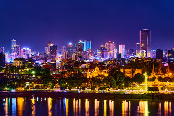 city skyline at night phnom penh cambodia - obrazy, fototapety, plakaty