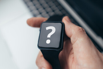 Question mark concept or FAQ. Sign on smart watch