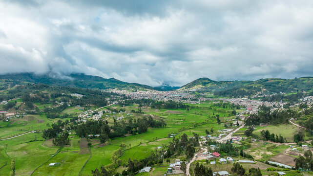 Aerial photo of green fields and the city of Cutervo, Cajamarca, Peru.