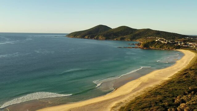 Regeneration park sand dunes on One Mile beach in Forster &ndash; aerial 4k.
