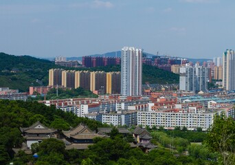 Fototapeta premium Jilin, Jilin, China - July 15 2021: The city of Jilin skyline in summer.