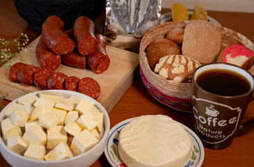 Some Méxican food Stuff, traditional bread, cheese, chorizo and coffe 