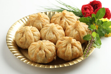 Modak, made from flour and coconut jaggery filling. Modak is a traditional Indian sweet made during...