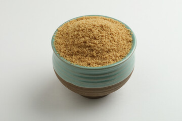 bowl of brown sugar Dark brown granulated sugar