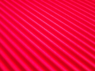 red background with longitudinal radial stripes