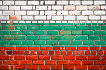 Bulgarian flag on a grunge brick background.