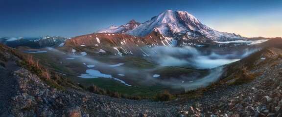 Mount Rainier National Park in the Cascade Range, Washington State, USA. A beautiful active volcano at sunset in North America. Summer time.