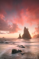 Coastline with sea stacks  in sunset time with red and purple light. Rialto Beach in Olympic...