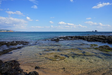seascape with clear rock beach