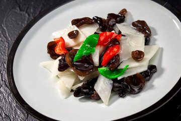 Asian cuisine fried black fungus with yam