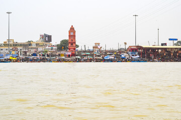 Naklejka premium Ganga as seen in Garh Mukteshwar, Uttar Pradesh, India, River Ganga is believed to be the holiest river for Hindus, A view of Garh Ganga Brij ghat which is very famous religious place for Hindus
