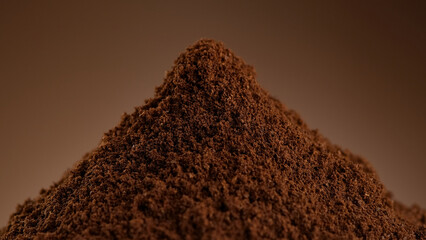 Ground coffee close up. Stack of ground coffee