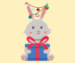 a pet rabbit holding a gift and New Year's toys on its ears