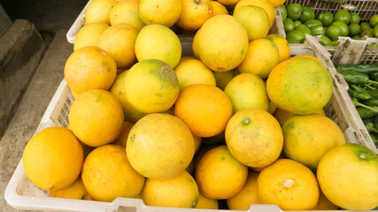 Mounds of lemons in a container box