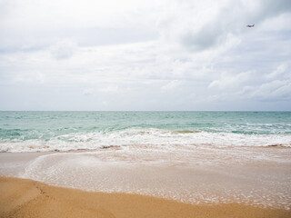 Sand beach with blue sea and blue sky and white cloud beautiful at coast. beautiful blue ocean shore outdoor nature landscape water  background. tourist summer travel holidays tropical season.