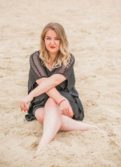 Nice plus size model at beach, European woman in casual dress, big size fashion
