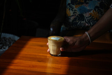 A cup of coffee with love. coffee latte. heart shaped in coffee latte