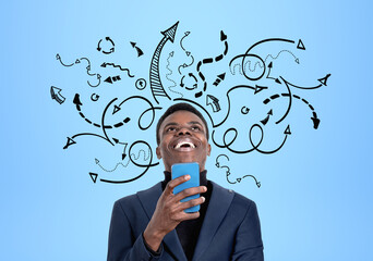Black businessman laughing with phone in hand, arrows with different direction