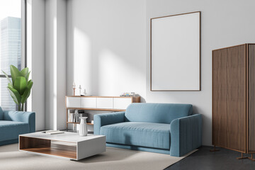 Chill interior with couch and coffee table, panoramic window. Mockup frame