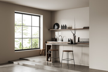 Corner view on bright kitchen room interior with cupboard, island