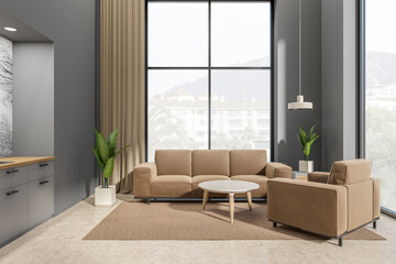 Grey studio interior with couch and chairs, relax and cooking space with window