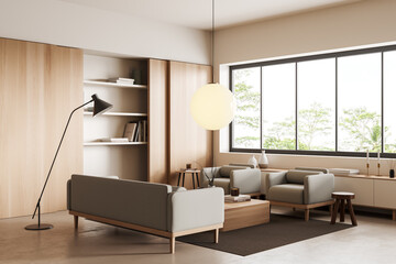 Stylish chill interior with couch and chairs, decoration and panoramic window