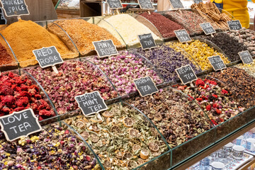 Colorful herbal tea footage from Mısır bazaar stand, herbal products in arcade market stands, flu...