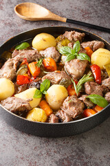 Peka Croatian Meat and Vegetable Stew close-up on the table. Vertical