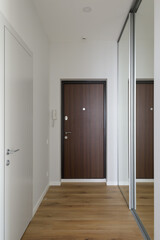 corridor in a modern apartment with light walls