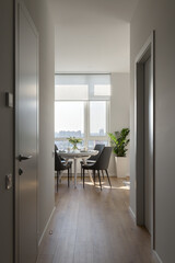 modern living room with kitchen, modern living room with light walls, breakfast in the apartment