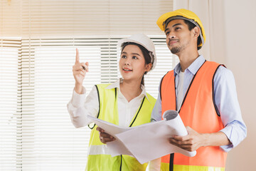 Team architect builder home or apartment, worker asian inspecting reconstructed construction...