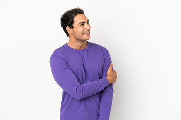 Caucasian handsome man over isolated white background laughing