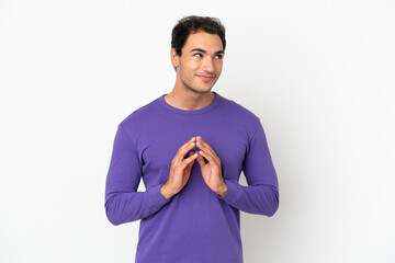 Caucasian handsome man over isolated white background scheming something