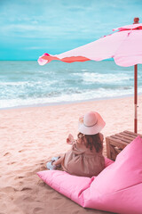 Traveler asian woman travel and relax on beach in Pattaya summer Thailand