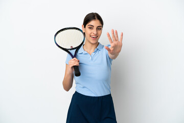 Handsome young tennis player caucasian woman isolated on white background counting five with fingers