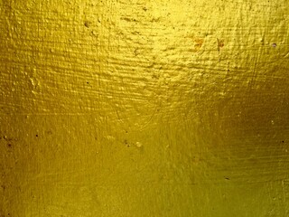 Gold color concrete wall texture 