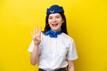 Airplane stewardess Russian woman isolated on yellow background happy and counting four with fingers