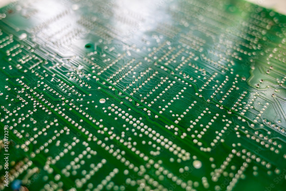 Poster old computer chips that are out of order. not working microshops with transistors, chips and conduct