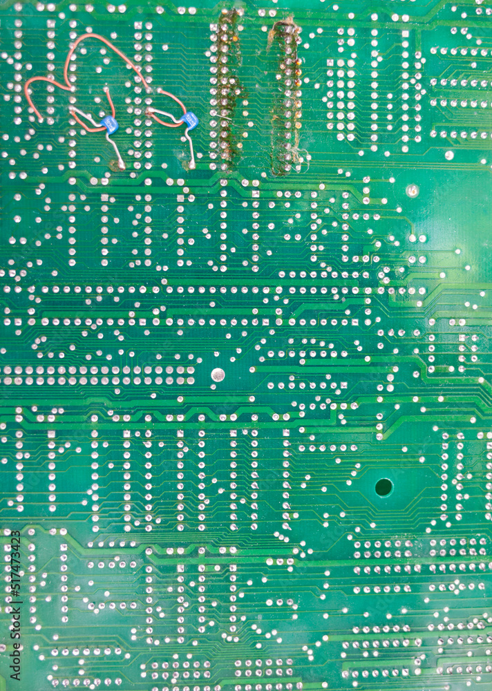 Fototapete old computer chips that are out of order. not working microshops with transistors, chips and conduct