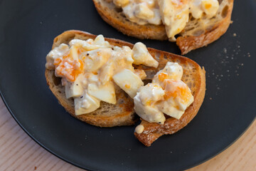 Egg salad on sourdough bread.