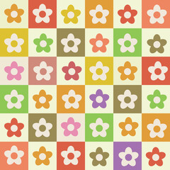 Cute retro flowers seamless pattern on multicolored checkerboards. For textile, home décor, stationary and gift wrapping paper  