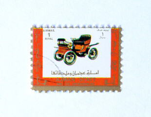 Ajman - circa 1973 : Cancelled postage stamp printed by Ajman, that shows Antique vehicle, circa...
