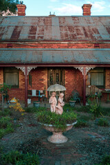 old abandoned house with water fountain