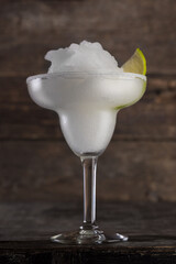 Mojito cocktail in a beautiful glass with mint and lime