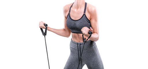 Image of a sports girl who trains with rubber bands in a white studio. Fitness and bodybuilding...