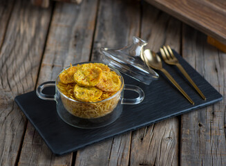balalet or balaleet served in a dish isolated on cutting board side view of breakfast on wooden background