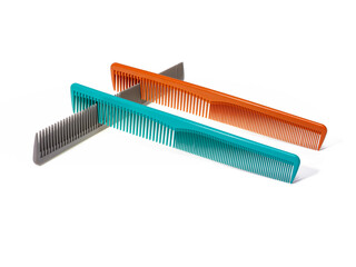 Professional colorful hair combs, hairdresser's tool, for cutting hair, isolated on white