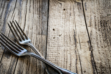 Wood grain texture - empty pine boards with two forks on
