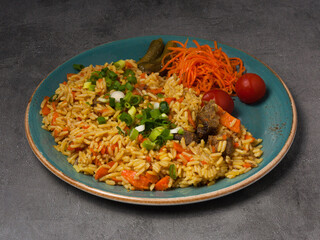 pilaf with beef, cucumbers, tomatoes, green onions